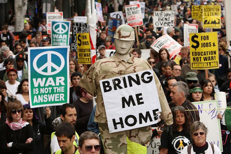 Anti-war demonstrators participate in a protest march on Hollywood Boulevard 